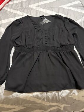 Black Long-Sleeve V-Neck Smocked Waist Blouse towards size 1 from torrid